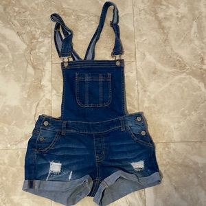 Blue ripped shot overalls
